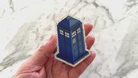 A video of Doctor Who Tardis Glitter Vinyl Sticker by Closet Planner Addict (VN-006)